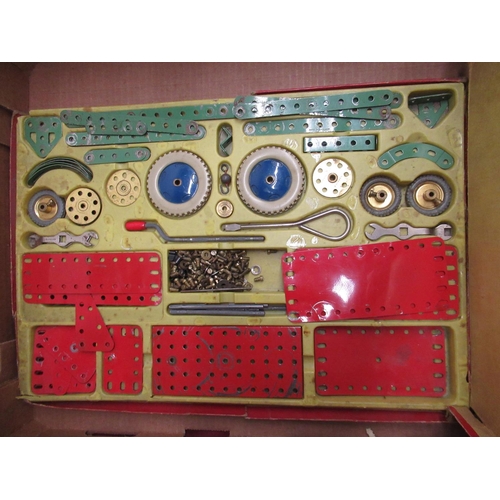 128 - Meccano Outfit no.3 in original box and packaging, other Meccano components, two electric motors, co... 