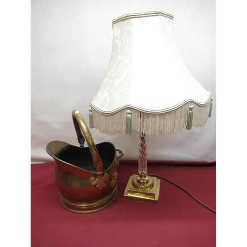 134 - Gilt cast metal and crystal column table lamp with shade on stepped base, H41cm, small brass fuel bi... 