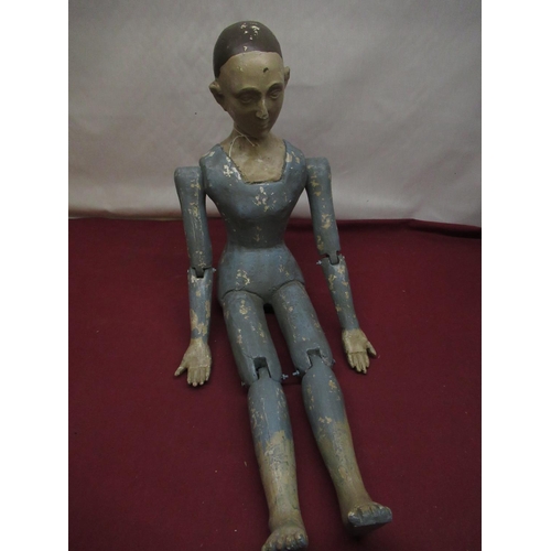 144 - Part articulated composition model of a seated girl, H47cm