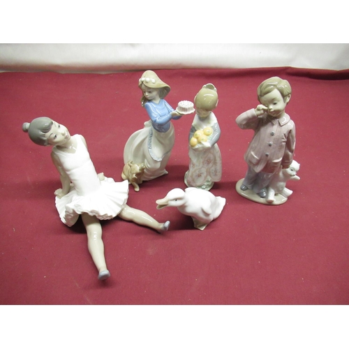 246 - Selection of Lladro and Nao figurines including 4841 Valencian girl, Puppy's Birthday etc (5)