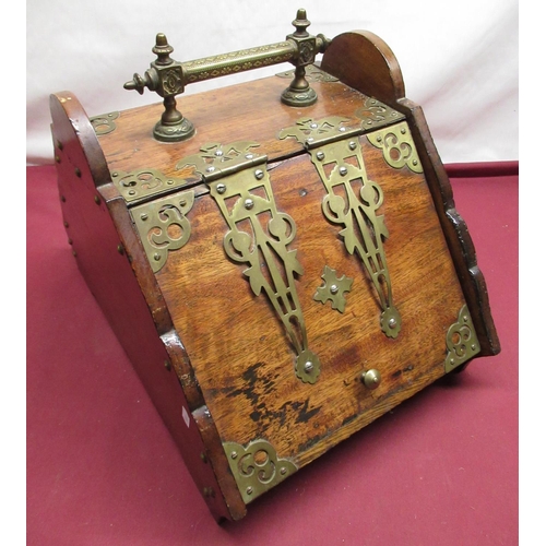 65 - C19th oak purdonium coal scuttle with gothic style brass mounts in a trapezoid form, H33cm