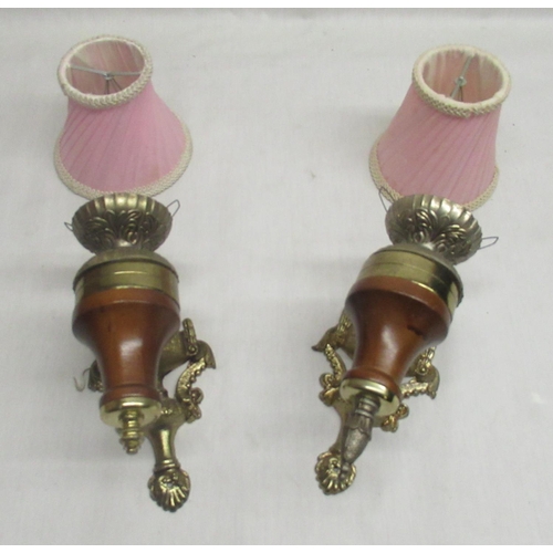 526 - Pair of brass and wood wall lights with pink lamp shades