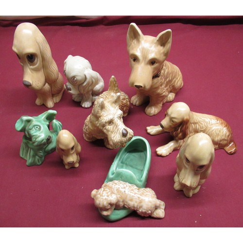 269 - Collection of nine Sylvac dogs of various sizes and colours, max H20cm (9)