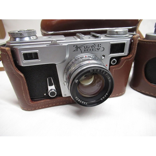 442 - Russian Zorki 4 rangefinder camera, Kiev rangefinder camera, Ricoh RZ-735 camera, pair of French gre... 