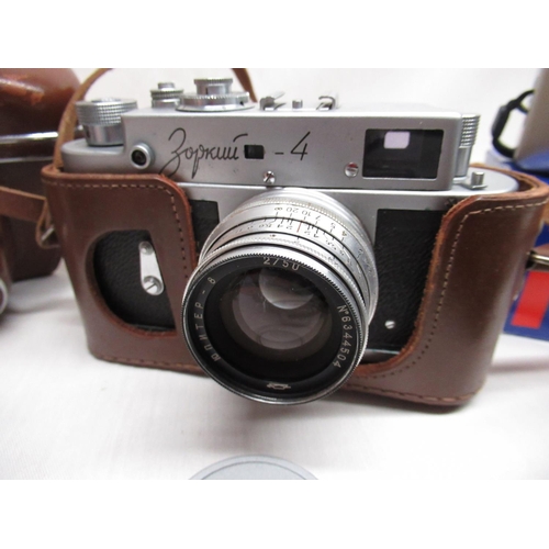 442 - Russian Zorki 4 rangefinder camera, Kiev rangefinder camera, Ricoh RZ-735 camera, pair of French gre... 