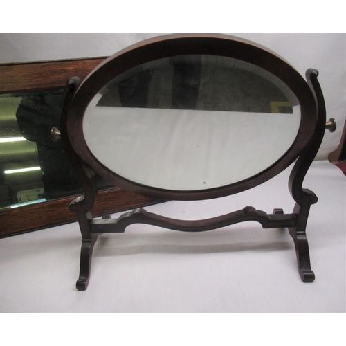 543 - Regency style mahogany framed toilet mirror, oval plated on curved supports, out splayed feet joined... 