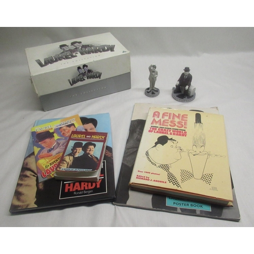 587 - Selection of Laurel and Hardy collectables incl. porcelain figurines, books and DVD collection