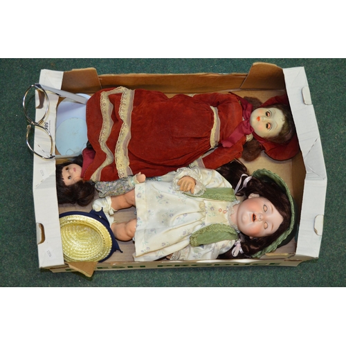 591 - Withdrawn - Set of three bisque head dolls in varying styles with handmade clothing and open and clo... 