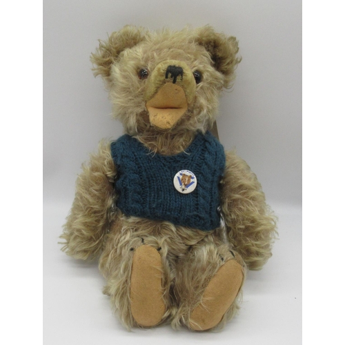 592 - c.1960s Zotty type teddy bear wearing a blue knitted vest H36cm