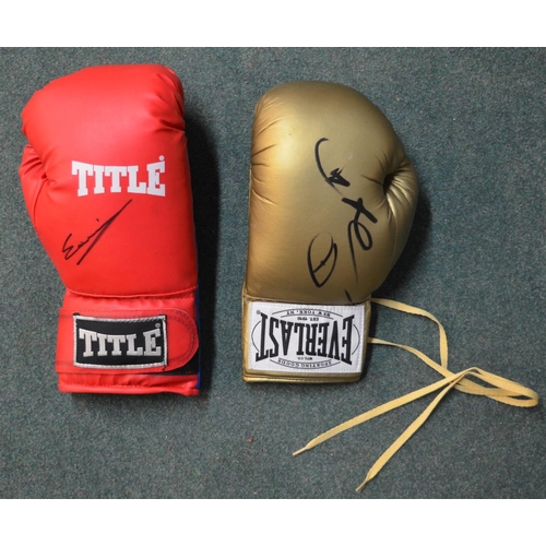 597 - Two signed boxing gloves (signature unidentifiable)