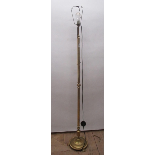 194 - Geo. III style gilt metal floor lamp, brass fluted column on circular beaded base and three paw feet... 