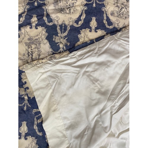 1437 - David Hall Collection - Pair of curtains with blue Toile de Jouy motifs, musical bars of ribbon on a... 