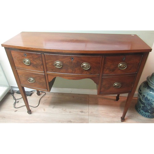 193 - Geo. III style mahogany bowfront kneehole sideboard, with drawer and two doors on square tapered sup... 