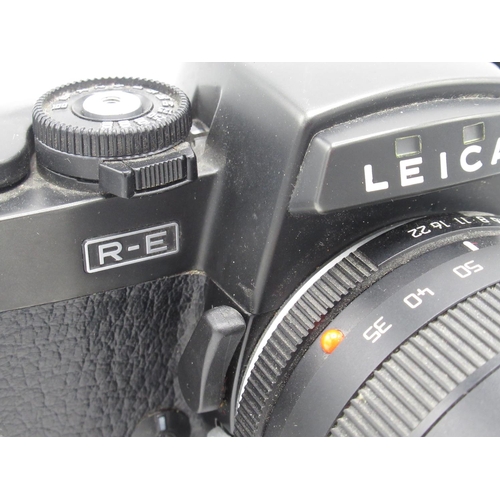 1096 - Leica R-E 35mm SLR camera with Leica Vario-Elmar 35-70 F4 lens and instruction book.