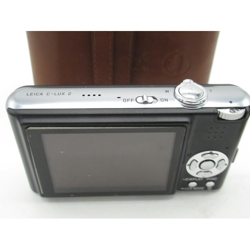 1104 - Leica C-lux 2 digital camera in black and silver, with leather case (no charger) with original outer... 