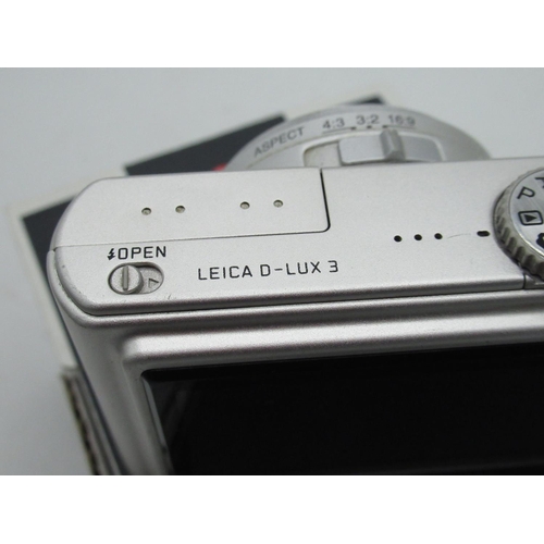 1105 - Leica D-Lux 3 digital camera in silver finish with Lecia fitted leather case, charger, four spare ba... 