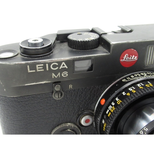 1077 - Leica M6 in black finish with Leica Elmar 50mm F2.8 collapsible lens, camera serial no. 1704853
(wit... 