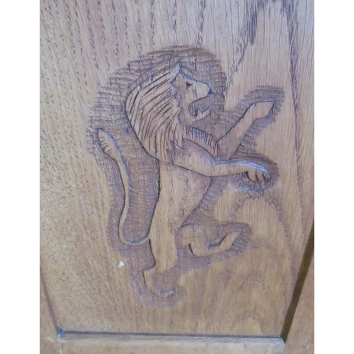 1479 - Yorkshire Oak - Telephone seat of panelled construction with adzed top and lion carved panel door on... 