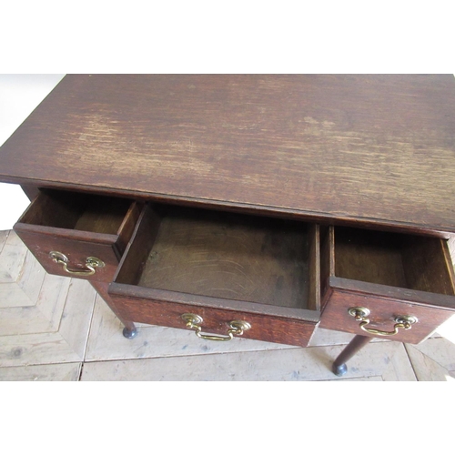 1531 - Geo. III oak lowboy, overhanging moulded top above two deep and one shallow drawers, with shaped fri... 