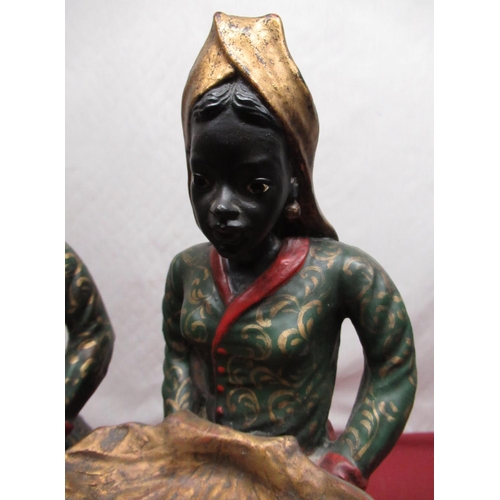 1517 - Pair of Regency style painted models of standing Blackamoors with shell trays, on square bases, H52c... 