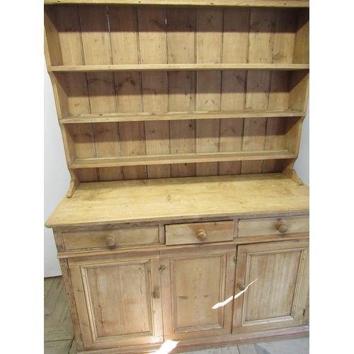 1542 - Victorian waxed pine kitchen dresser, three tier raised back with moulded cornice, projecting base w... 