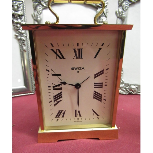 108 - Large Swiza eight day brass cased carriage clock alarm, H14cm including handle, smaller Swiza lacque... 