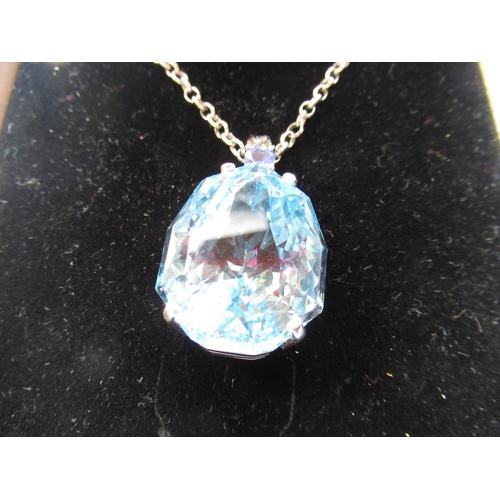 1132 - 18ct white gold mounted blue topaz and sapphire pendant necklace, stamped 750, blue topaz approx. 89... 