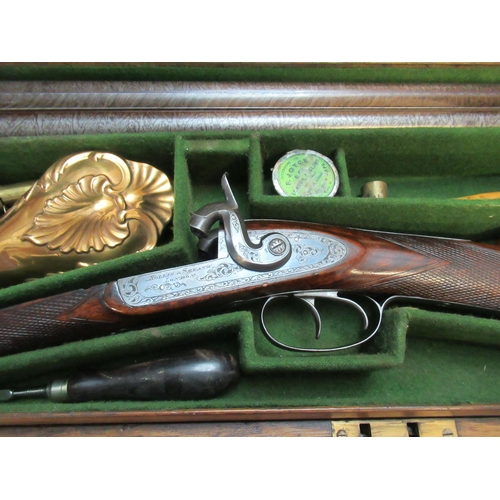 1056 - Oak cased Hollis and sheath 11B percussion cap side by side shotgun, with 27