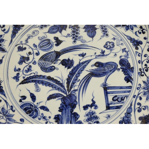 1344 - WITHDRAWN - Large Chinese circular charger with shaped edge, blue and white decorated with exotic fl... 