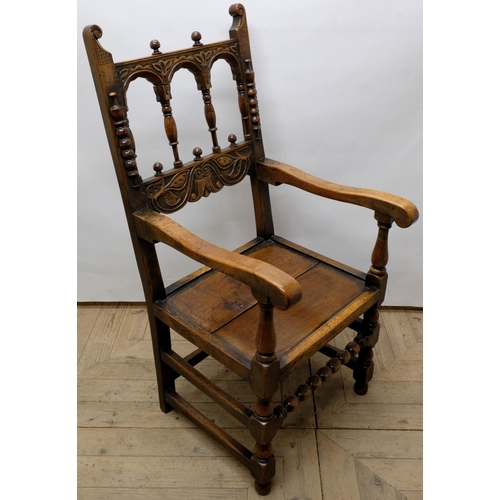 1559 - Charles II style oak open armchair, the triple arcade back with ball finials, solid seat on turned a... 