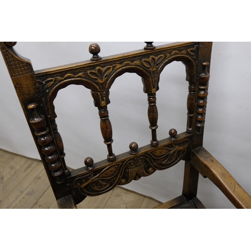 1559 - Charles II style oak open armchair, the triple arcade back with ball finials, solid seat on turned a... 