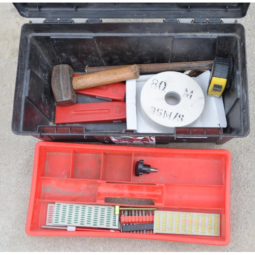 111 - Two tool boxes, smaller box containing heavy wood splitters, chisels, small hammer, etc, larger whee... 