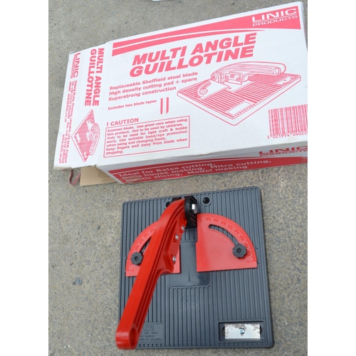 113 - Plastic toolbox containing soldering and electrical testing set, new in sleeve, multi angle guilloti... 
