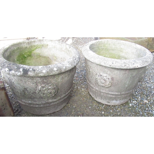 31 - Pair of composite stone plant pots, with Yorkshire rose emblem (2)