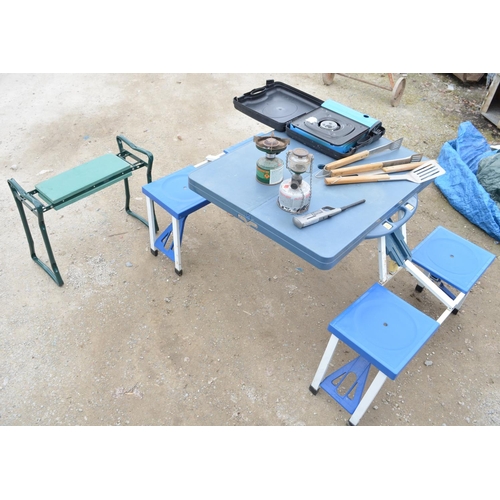 126 - Collection of camping equipment including folding table with seats, camping stove, gas burners, barb... 