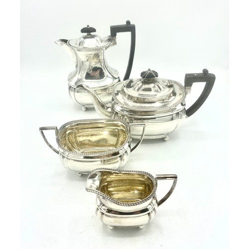 1140 - Edw.VII hallmarked Sterling silver four piece tea service, shaped rectangular bodies with gadrooned ... 