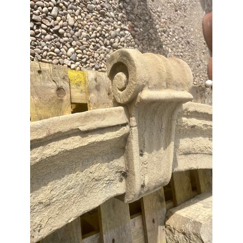 1581 - Pair of C19th stone door frame arches, angular uprights and arched top with scrolled cresting, H183c... 