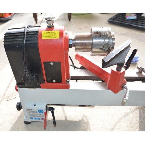 116 - Axminster Hobby Series AH1218VS wood turning lathe with box containing number of various replacement... 