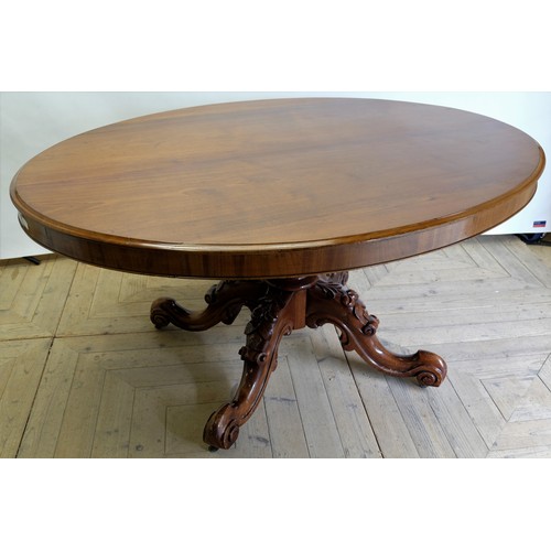 1564 - Victorian mahogany breakfast table, oval tilt top on bold baluster turned column support, the four o... 