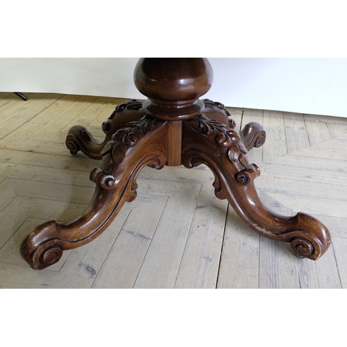 1564 - Victorian mahogany breakfast table, oval tilt top on bold baluster turned column support, the four o... 