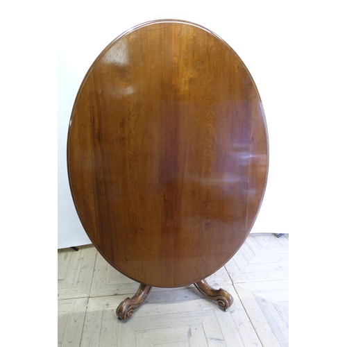 1564 - Victorian mahogany breakfast table, oval tilt top on bold baluster turned column support, the four o... 