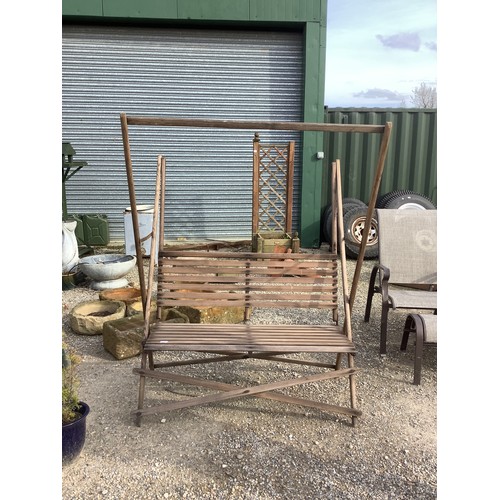 35 - Wooden folding garden bench with framework for parasol
