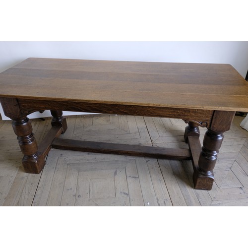 1554 - C17th style oak refectory table, rectangular planked top with plain frieze on bold turned supports, ... 