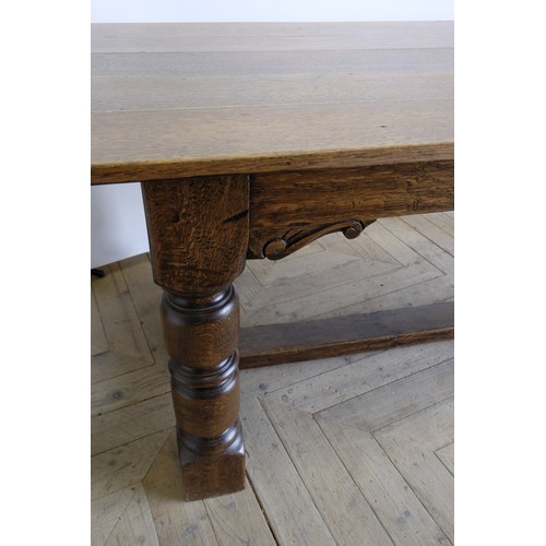 1554 - C17th style oak refectory table, rectangular planked top with plain frieze on bold turned supports, ... 