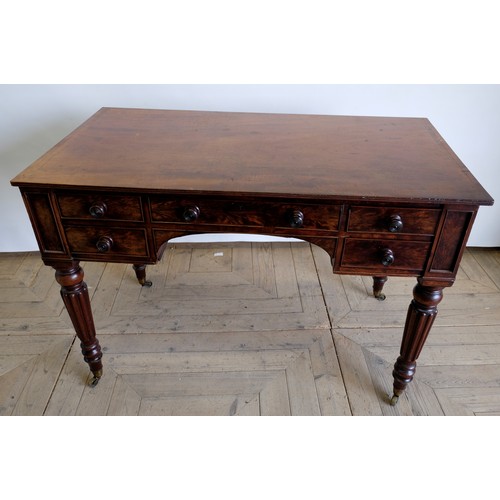 1571 - William IV mahogany kneehole desk, reeded top above four short and one long cockbeaded drawers with ... 