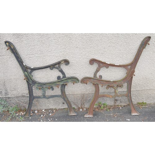 168 - Pair of cast iron bench ends