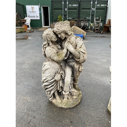 68 - Composite statue of a young couple embracing in 18th century dress