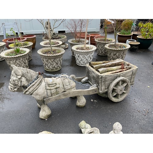 155 - Large reconstitute stone Shire horse pulling log cart on wheels