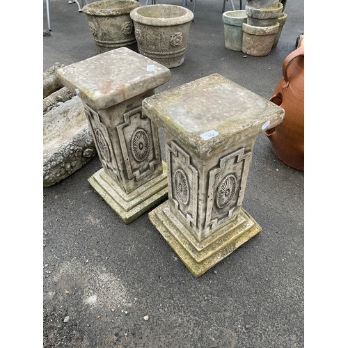 152 - Pair of reconstitute stone plinths with Greek style decoration