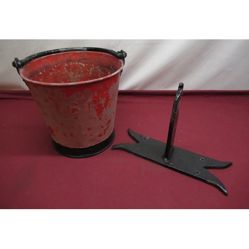 205 - C20th red cast metal fire bucket with hanging bracket